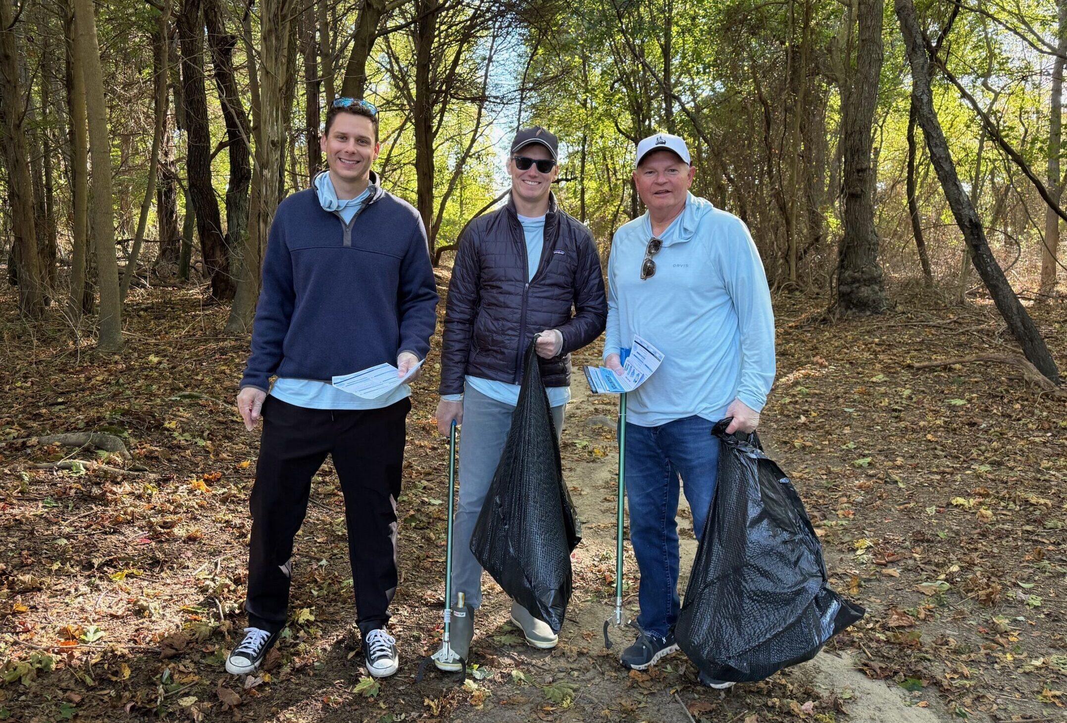 Evan, Jack, and Scott collecting debris and recording data