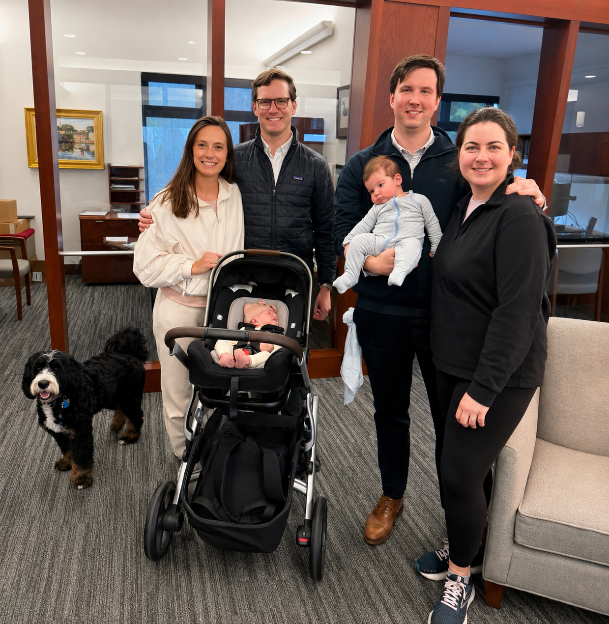 The Ryan and Wolff families together in the Lightship office, with babies Cormac and Charlotte.